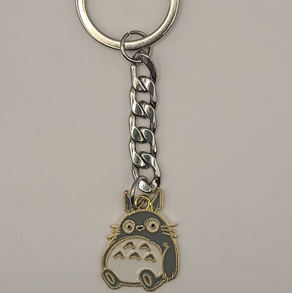 Anime Character Keychain with Silver and Gold Accents